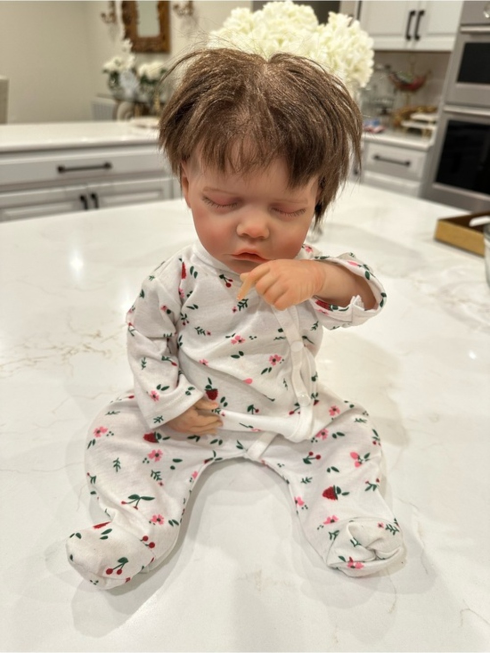 Babeside Realistic Baby Doll with Brown Hair with floral onesie pajamas